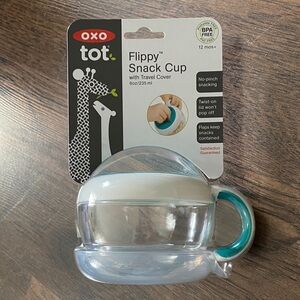 Oxo Tot Flippy Snack Cup in Teal and Clear with Cream Trim